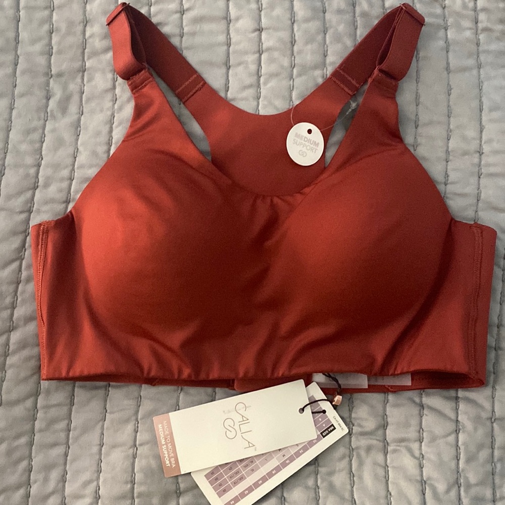 Calia sports bra size small burnt orange color brand new